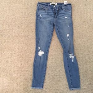 ripped blue skinny jeans